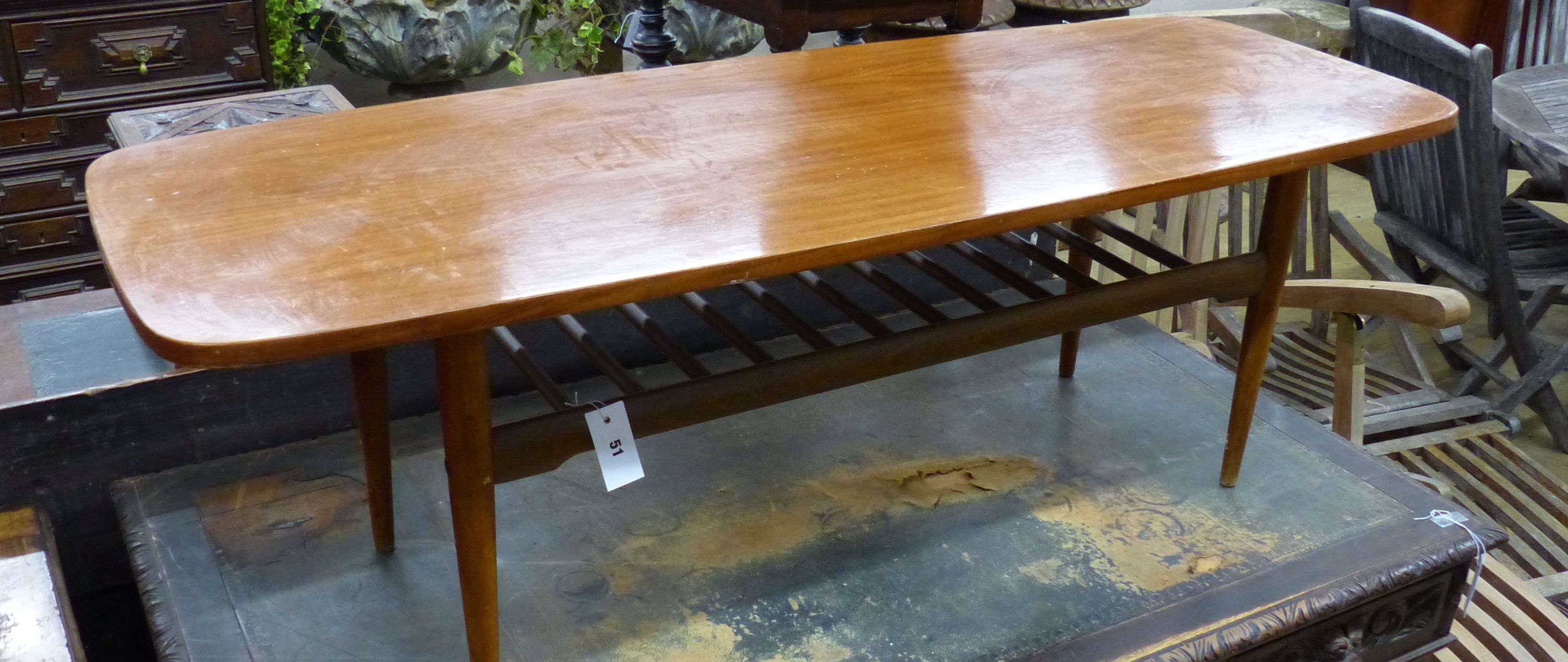 A 1960's teak coffee table, width 137cm